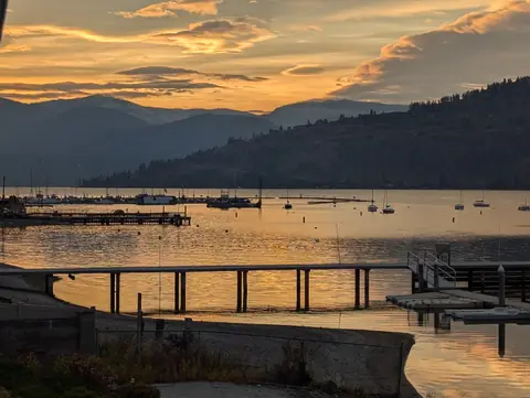 Golden sunset over the docks and sailboats, Okanagan Lake at Okanagan Landing, Vernon, B.C., November 8, 2024